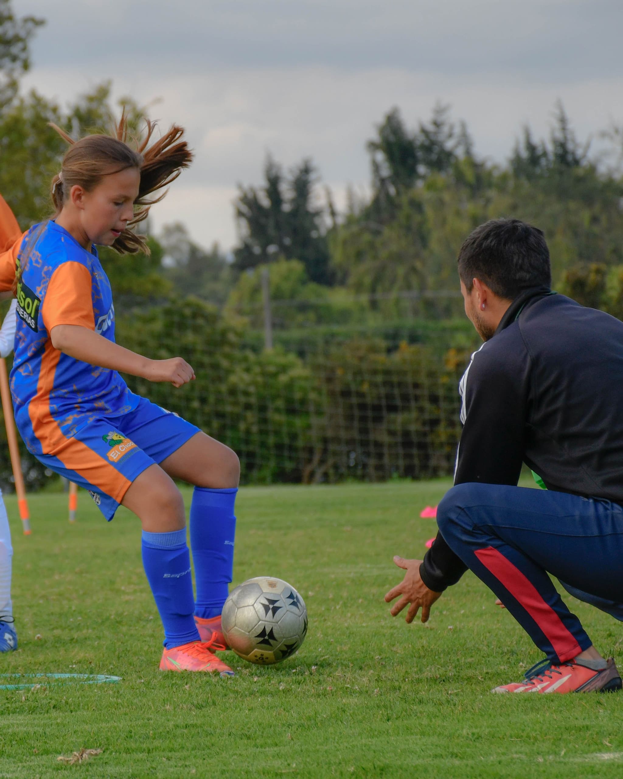 A parent and child at training